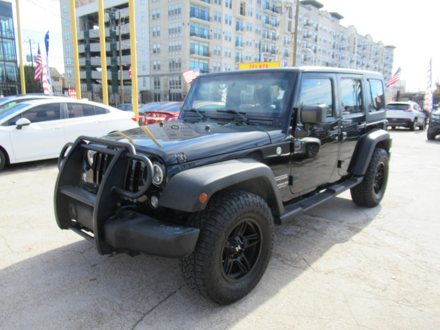 2017 Black /Black Jeep Wrangler UNLIMITED SPORT (1C4BJWDG1HL) with an 3.6L V6 F DOHC 24V engine, Automatic transmission, located at 1511 North Shepherd Dr., Houston, TX, 77008, (281) 657-1221, 29.798361, -95.412560 - 2017 JEEP WRANGLER UNLIMITED SPORT VIN: 1C4BJWDG1HL517754 1 C 4 B J W D G 1 H L 5 1 7 7 5 4 4 DOOR WAGON/SPORT UTILITY 3.6L V6 F DOHC 24V GASOLINE REAR WHEEL DRIVE W/ 4X4 - Photo#17